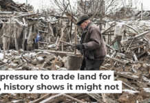 An elderly Ukrainian walks through the rubble following a Russian aerial bomb strike in Donetsk Oblast. Diego Herrera Carcedo/Anadolu via Getty Images
